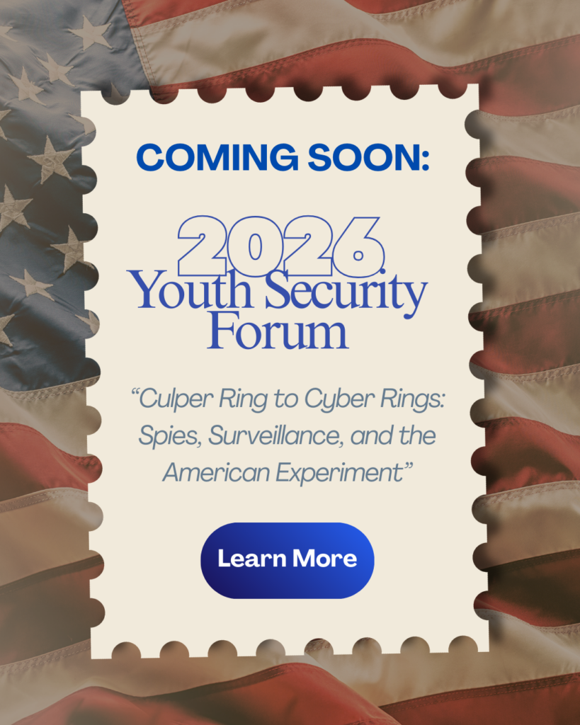 A promotional graphic for the 2026 Youth Security Forum, styled like a postage stamp with a perforated edge. The stamp is set against a blurred background of the American flag. The text reads: 'COMING SOON: 2026 Youth Security Forum. “Culper Ring to Cyber Rings: Spies, Surveillance, and the American Experiment.”' A blue 'Learn More' button is at the bottom.